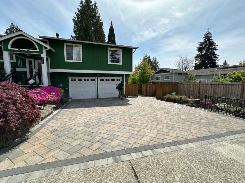 After - Complete paver driveway installation with herringbone pattern in Kent WA